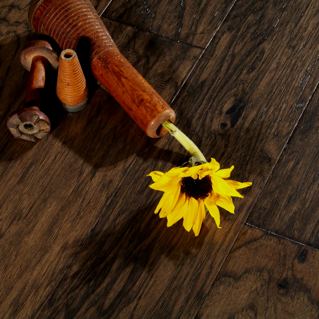 Close up picture of Woodhouse, Brentwood, Charleston Wood Flooring with yellow sunflower