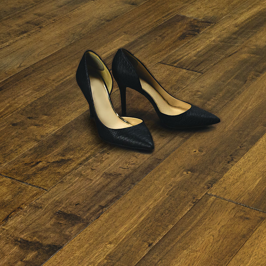 Woman's high heel shoes on wood flooring