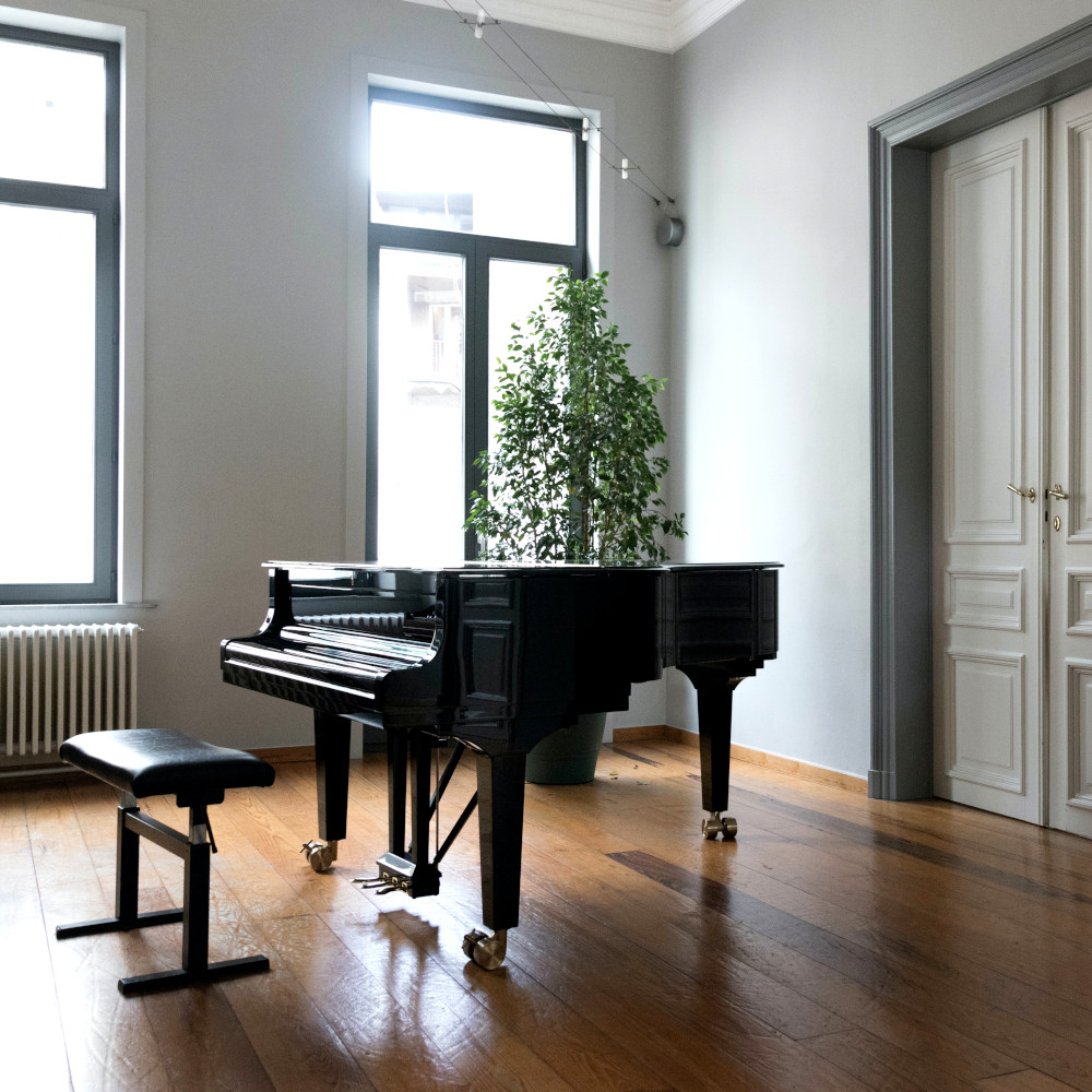 Baby Grand on wood floor in historic home