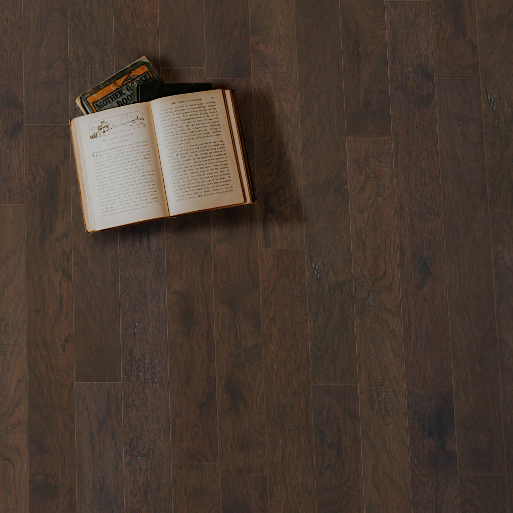 Woodhouse, Dumont Rolling Hills engineered wood floor shown with an open book