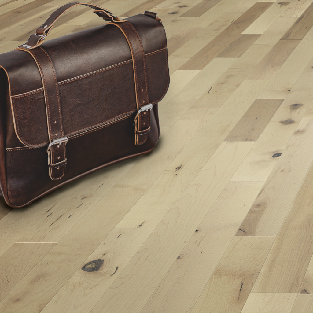 Woodhouse, Frontenac Collection, Lancaster maple solid wood floor shown with a leather messenger bag